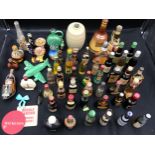 A quantity of 53 vintage glass and novelty bottles to include 40 miniatures and 13 others : Martell,