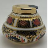 Royal Crown Derby Old Imari pattern No. 1128 table lighter. 6cm h.Condition ReportGood condition.