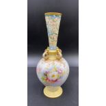 Doulton Burslem 19thC vase approx 22cm high. Decorated with flowers and foliage with raised enamel