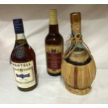 Three bottles of alcohol to include , Martell Cognac, Prince Brindley?s Five Year Old Jamaica Rum