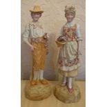 A pair of 19thC continental bisque figurines. 37cm h.Condition ReportSmall chip to underside of male