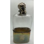A silver and glass hip flask Birmingham 1905 Mappin & Webb. 16cm h.Condition ReportBash to top and