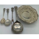 White metal to include bon bon dish, 3 spoons and a fork. 123.5gm total weight. All marked 800.