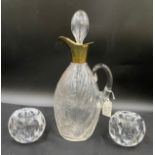 A cut glass claret jug with silver spout Chester 1903 James Deakin & Sons together with a pair of