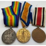 Two WWI Service medals for 32306 Pte. A. Merritt S. Staff. R. and a special constabulary medal