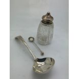 A glass and silver topped pepper pot, a sauce ladle Sheffield 1962 and a salt spoon Birmingham 1890.