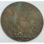 A WWI bronze memorial plaque or 'Death Penny' awarded posthumously in commemoration of Frederick