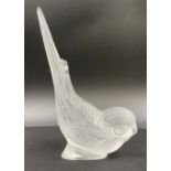 A Lalique glass paperweight modelled as a parakeet with head down, tail up, engraved 'Lalique ®