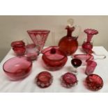 A selection of 19thC cranberry glass together with later ruby glass to include carafe with stopper