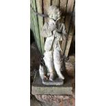 A concrete statue of a Georgian boy approx. 80cms h, 36cms x 39cms at base.Condition