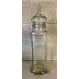 A chemist's cough drop glass lidded jar. 57cm high to top of lid. Base marked 'Made in England reg