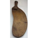 An adapted Mouseman cheeseboard. 33cm long.Condition ReportLoss to nose of mouse.