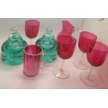 Victorian glass to include 2 green glass dump inkwells, four cranberry glass wine glasses, cranberry