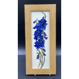 Moorcroft Delphinium framed plaque by Kerry Goodwin and monogrammed to base SP. Frame 36 x 15.5cm.