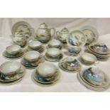 A vintage Japanese part tea service decorated landscape with storks. 12 cups and saucers, tea