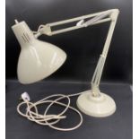 A good quality angle poise lamp. 1001 Lamps Limited. 108 Bromley Road, London.Condition