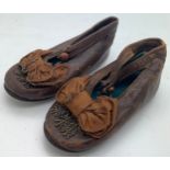 A pair of 19thC leather child's shoes. 10cm long with box and cut steel bead decoration.Condition