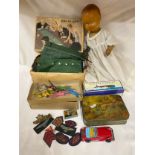 Escalado racing game together with plastic doll, Schylling tin speed boat, tin sportscar and an