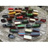A collection of Tin Plate railway items including trains, carriages/wagons etc.Condition