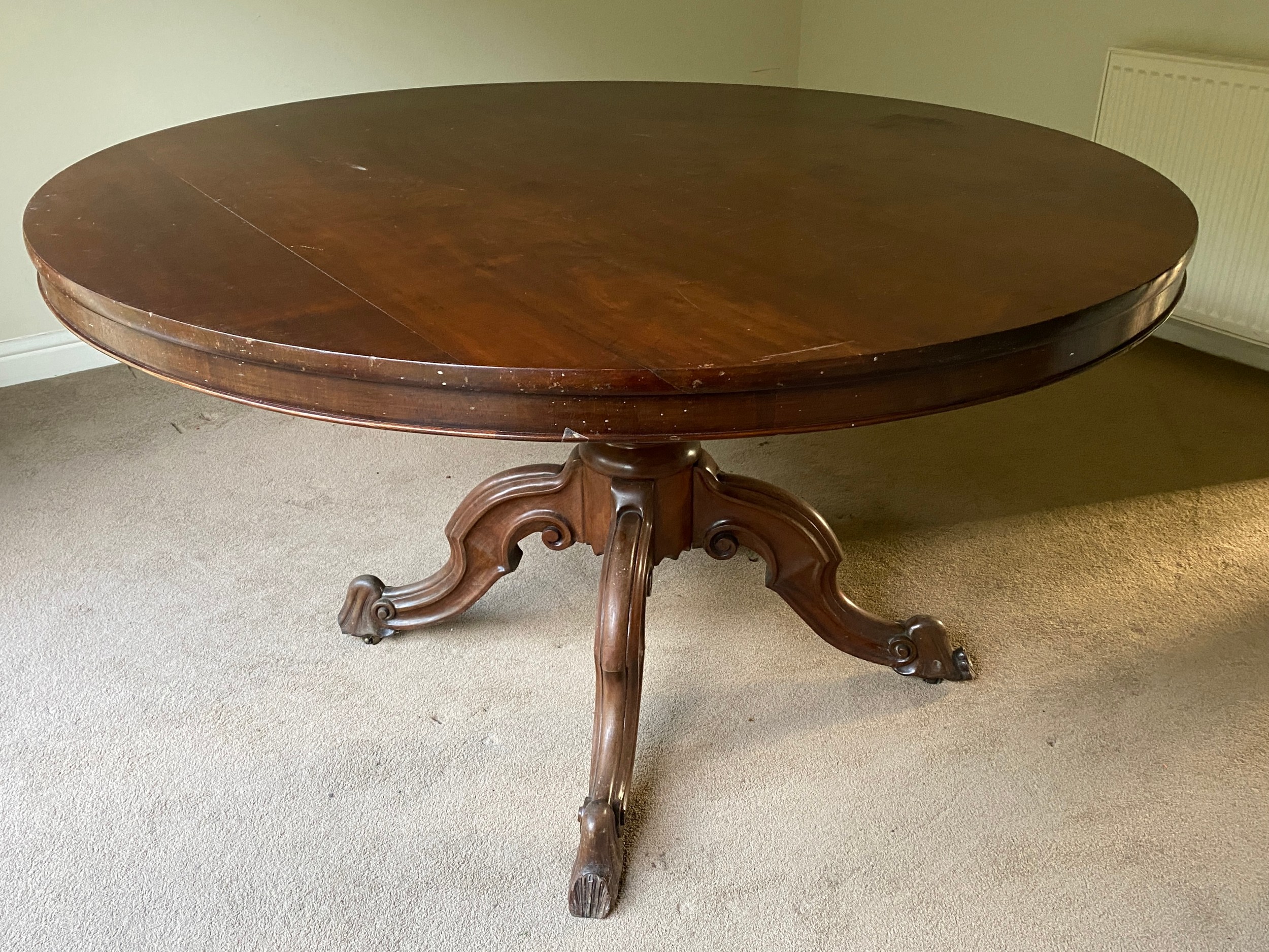 A mahogany Victorian tip top dining table on turned legs and tripod base. 132 diameter x 77cm h. - Image 2 of 9