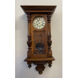 A late 19thC Vienna wall clock, spring driven 8 day movement, striking on a gong. 113 h x 51 w x