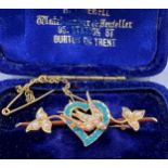 A turquoise and seed pearl Victorian bar brooch in original case, marked 15ct. 4.1gms.Condition