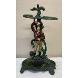 A cast iron painted umbrella/stick stand. With figure of gentleman to centre. 55cm h x 31cm w.