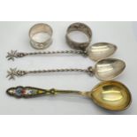 Russian silver enamel spoon together with two spoons and two napkin rings. 150gm total weight.