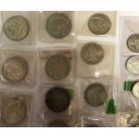 Collection of 19 British silver coins from 1920-1947 to include half crowns, florins, one