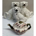 19thC ceramics including 3 Staffordshire dogs, a pair 32cm h, a single dog and a teapot.Condition
