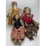 Late 19th/early 20thC costume dolls, to include Swiss cloth, bisque and others, x 5. Largest 20cm