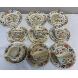 Part Masons tea service to include ups, 5 saucers, 4 plates, milk jug and sugar bowl.Condition