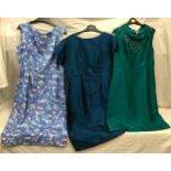 Three vintage dresses to include a Lincoln Model blue paisley dress, Teal silk dress by Emenson