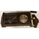 Mahogany wall mounted clock measuring approx 81cms in length 34cms wide and 18cms deep believed to