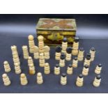 A complete 19thC bone chess set in a metal box.Condition ReportMost pieces with either stains or