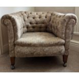 An Edwardian button backed tub armchair. 95 w x 80 d x 72cm h.Condition ReportSlightly rickety.