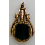 A 9ct gold watch fob/ key with blood agate to one side, initialled and date 1896 to reverse.