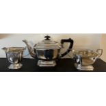 Three piece silver tea service with ebony handle and knop; Birmingham 1935 maker Elkington & Co.