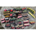 Tin plate clockwork trains, carriages and Chad Valley track to include Hurricane 34065, 7040, 416,
