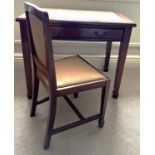 A mahogany leather topped desk with single drawer to front together with chair with matching leather