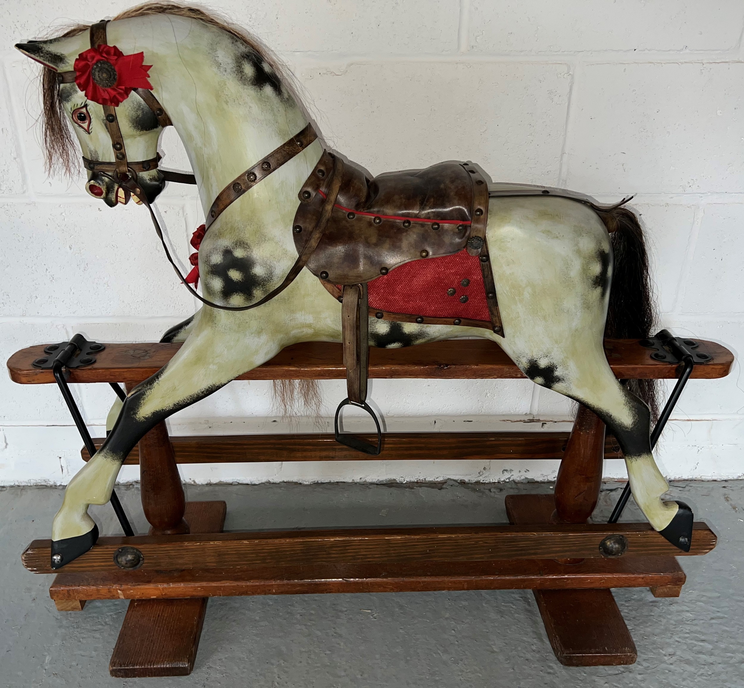 An Edwardian oak rocking horse. 107cm w.Condition ReportA full quality restoration.