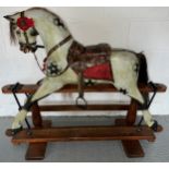 An Edwardian oak rocking horse. 107cm w.Condition ReportA full quality restoration.