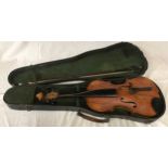 A Stradivarius copy violin with bow and case, label to interior, 56 cm l.Condition ReportLoose