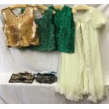 A selection of 1960's vintage clothing to include a light green dressing gown and matching slip by