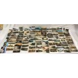 A 105 assorted postcards, colour and mono, British and European topographical cards.Condition