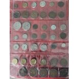 An album collection of British coins to includes sixpences (4 x pre 1947), shillings, crowns, one