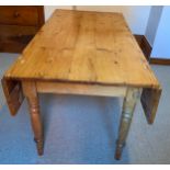 Pine drop leaf table with drawer to one end 68cms w x 122cms l, leaves down, 75cms h, 86cms w leaves