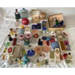 A collection of perfume bottles and various make up to include Goya, Avon, Tweed, Garay, Dubarry,