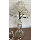 A glass and chrome table lamp. Approx 54xm h x 29cm w.