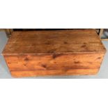 A pine blanket box. 110 w x 48 d x 41cm h.Condition ReportStaining to top.